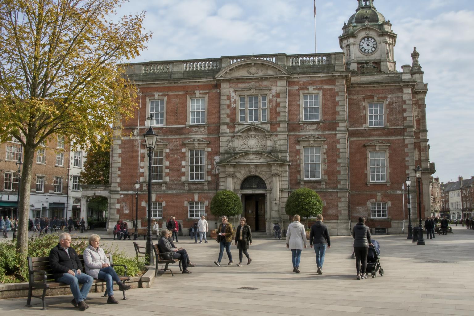 Residents in the square outside a British town hall