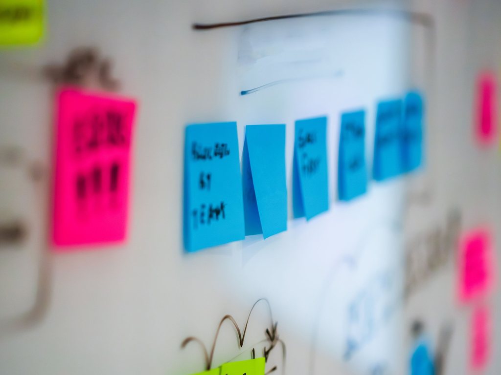 Sticky notes grouped on a planning wall